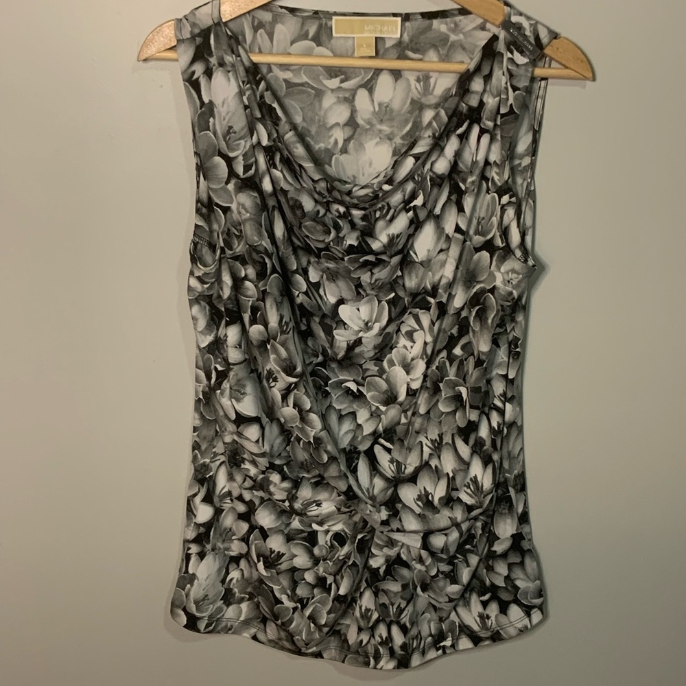 3/20$ Large Michael Kors sleeveless blouse.